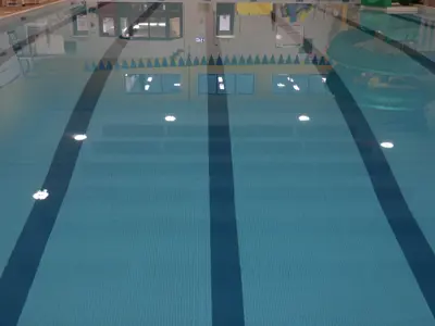Close up of the calm surface of the pool in the Recreation Centre.
